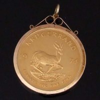 Lot 355 - Fine gold Krugerrand 1974, in 9ct gold mount.
