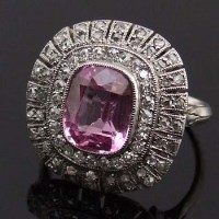 Lot 361 - French platium pink sapphire and diamond cushion