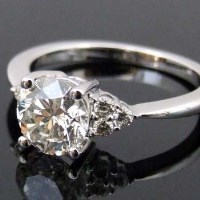 Lot 367 - 18ct white gold diamond ring, the central stone