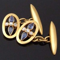 Lot 385 - Pair of diamond set cufflinks.