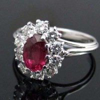 Lot 398 - 18ct white gold ruby and diamond cluster ring