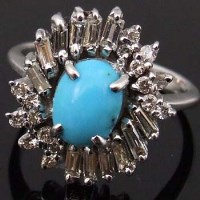 Lot 400 - Turquoise and diamond cluster ring, the cabochon