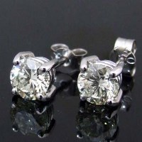 Lot 401 - Pair 18ct white gold diamond studs