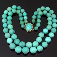 Lot 406 - Turquoise choker necklace of two strands of