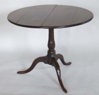 Lot 698 - George III mahogany tip top table