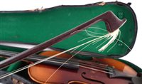 Lot 12 - Two cased violins and a cased trumpet and one other.